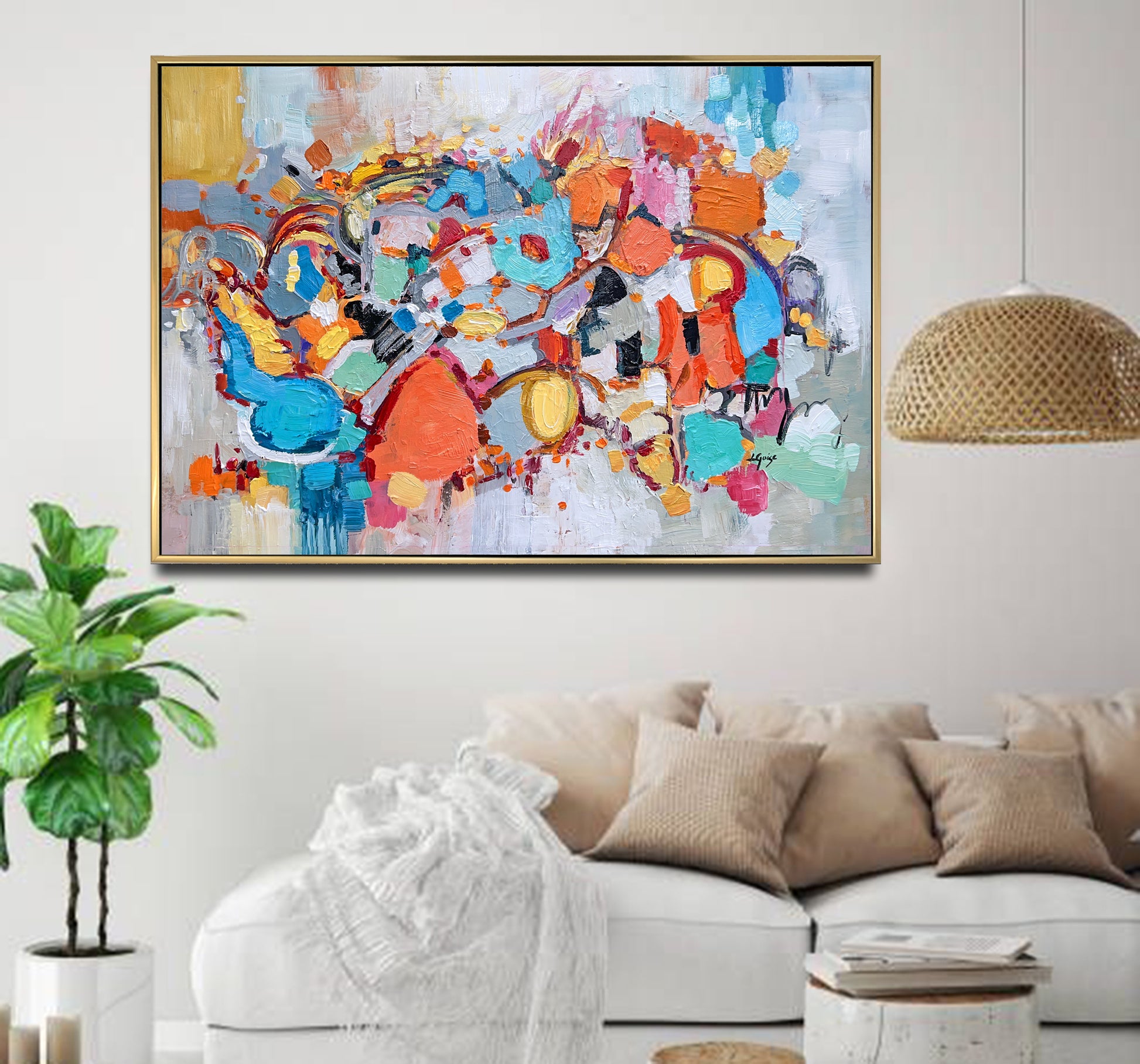 a living room with a couch and a painting on the wall