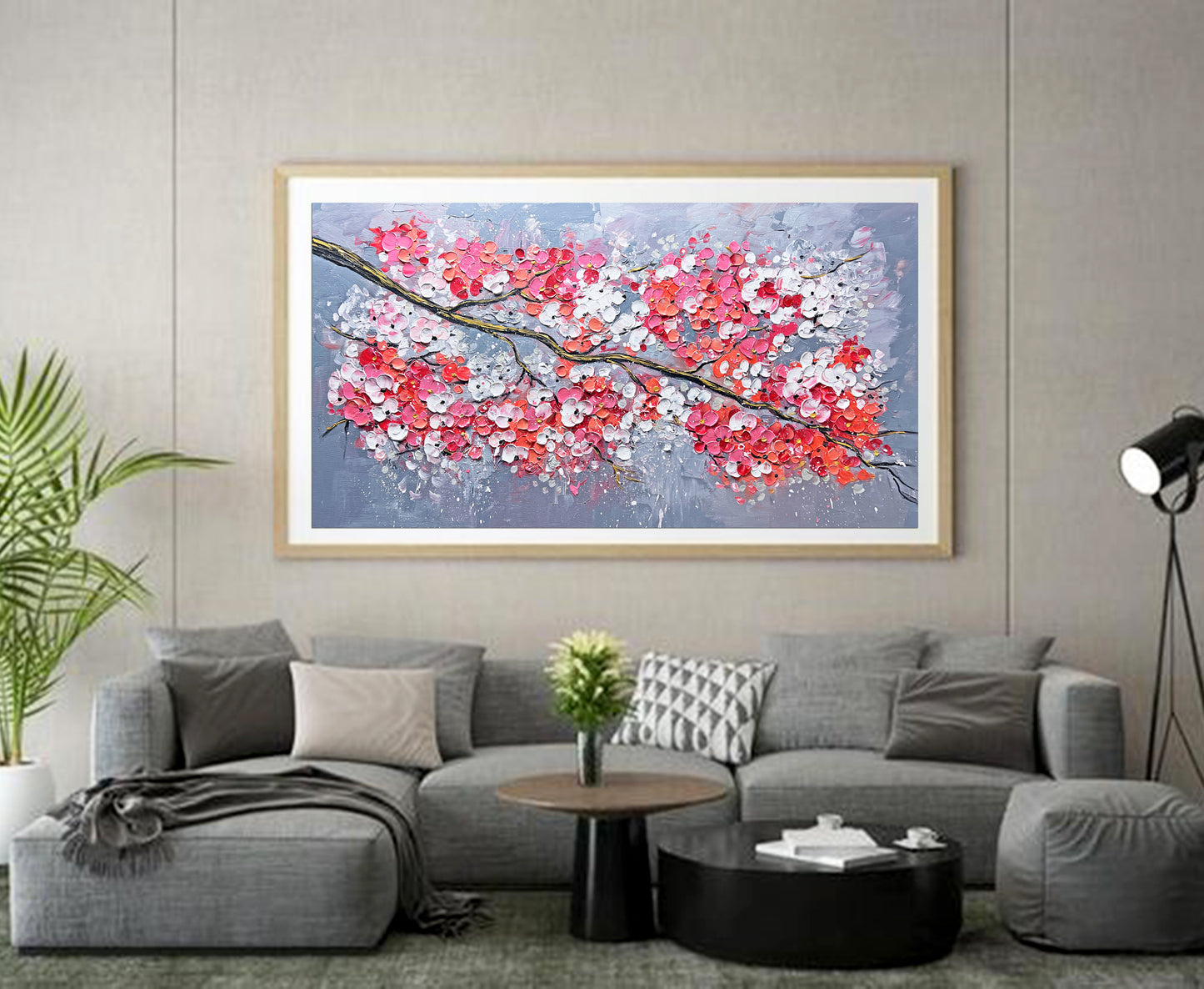 a living room with a couch and a painting on the wall