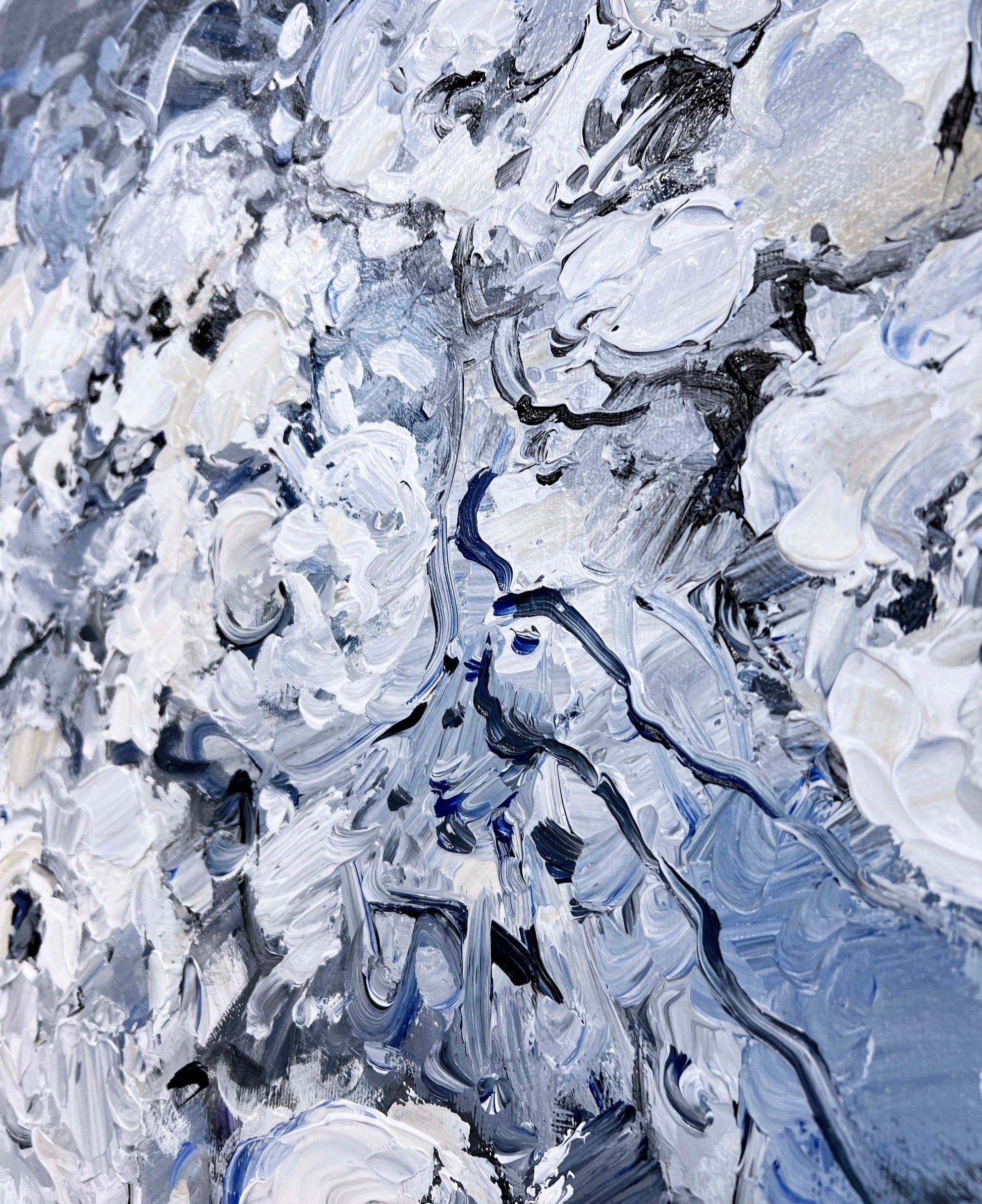 an abstract painting of blue and white colors
