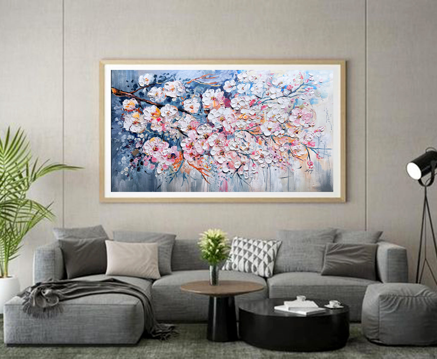 a living room with a large painting on the wall