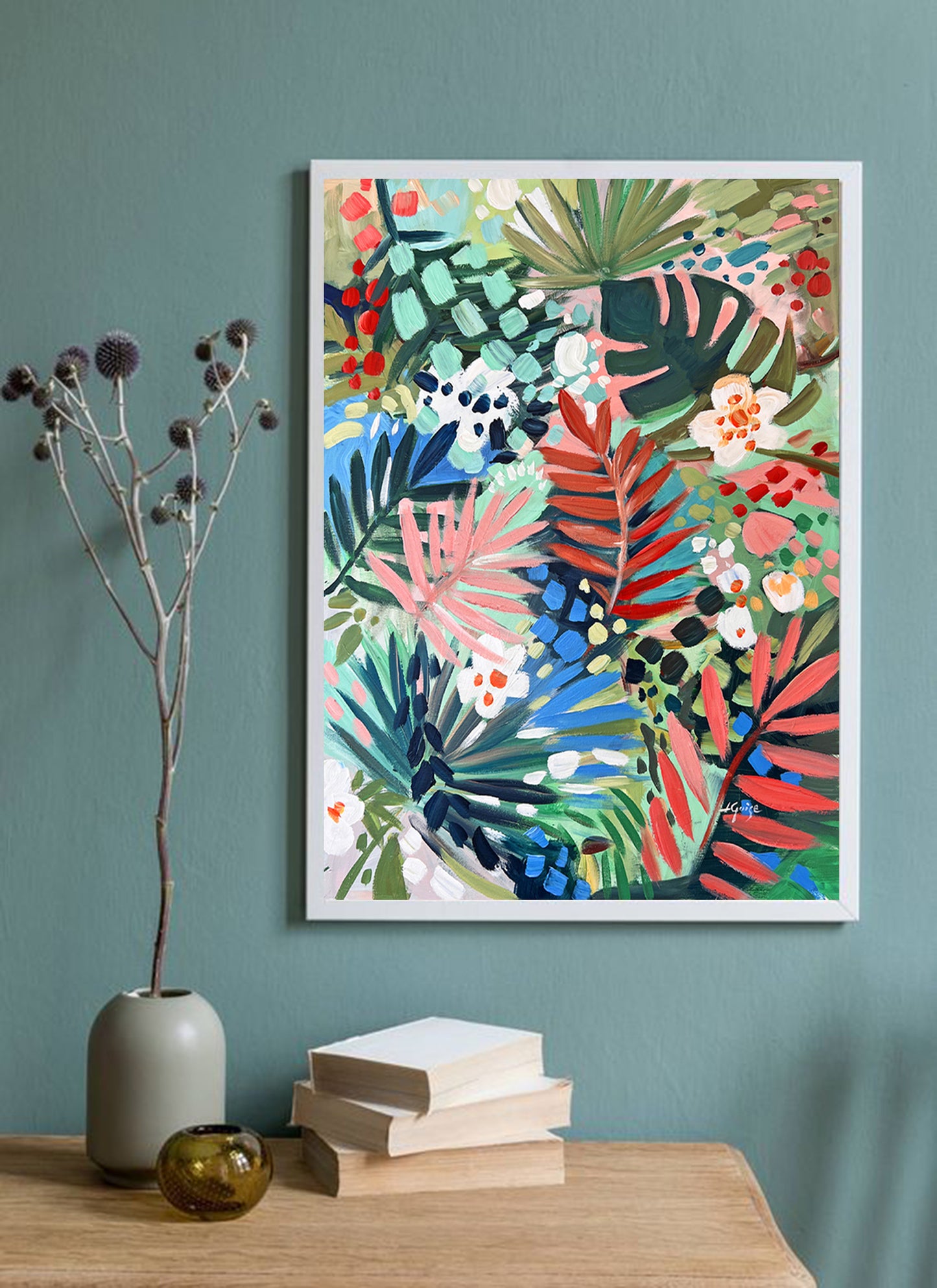 a painting on a wall next to a vase with flowers