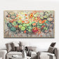 a living room with a couch and a painting on the wall