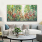a living room filled with furniture and a painting on the wall