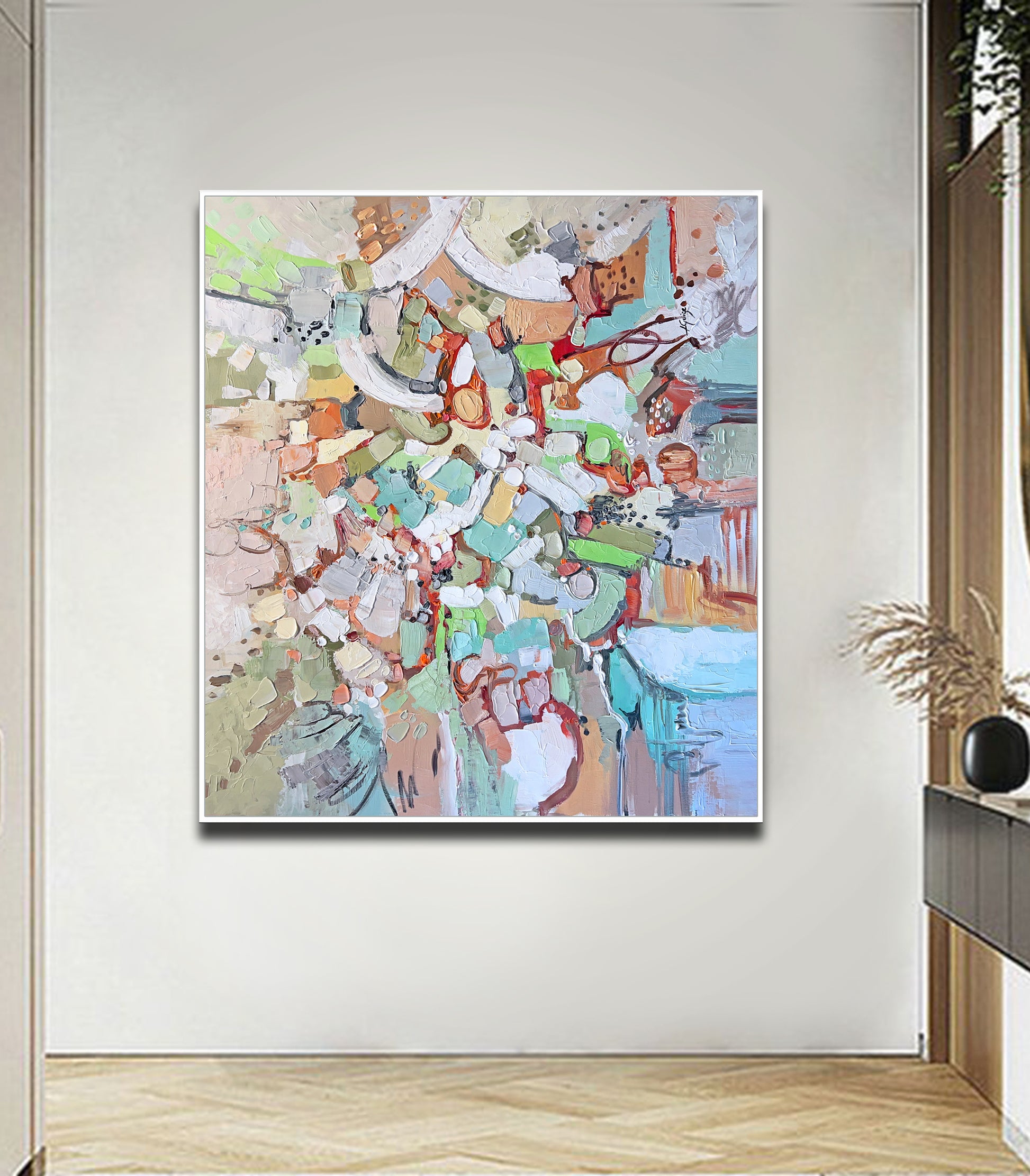 a painting hanging on a wall in a room
