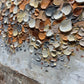a close up of a wall with a bunch of plates on it