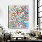 a large painting hanging on a wall above a dining room table