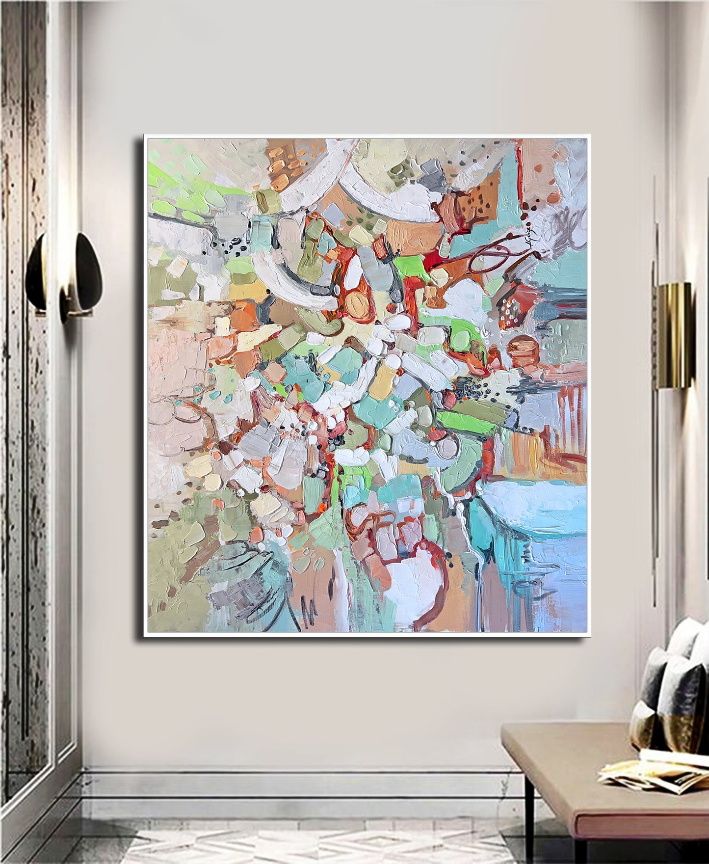 a large painting hanging on a wall in a living room