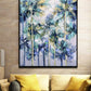 a living room with a couch and a painting on the wall