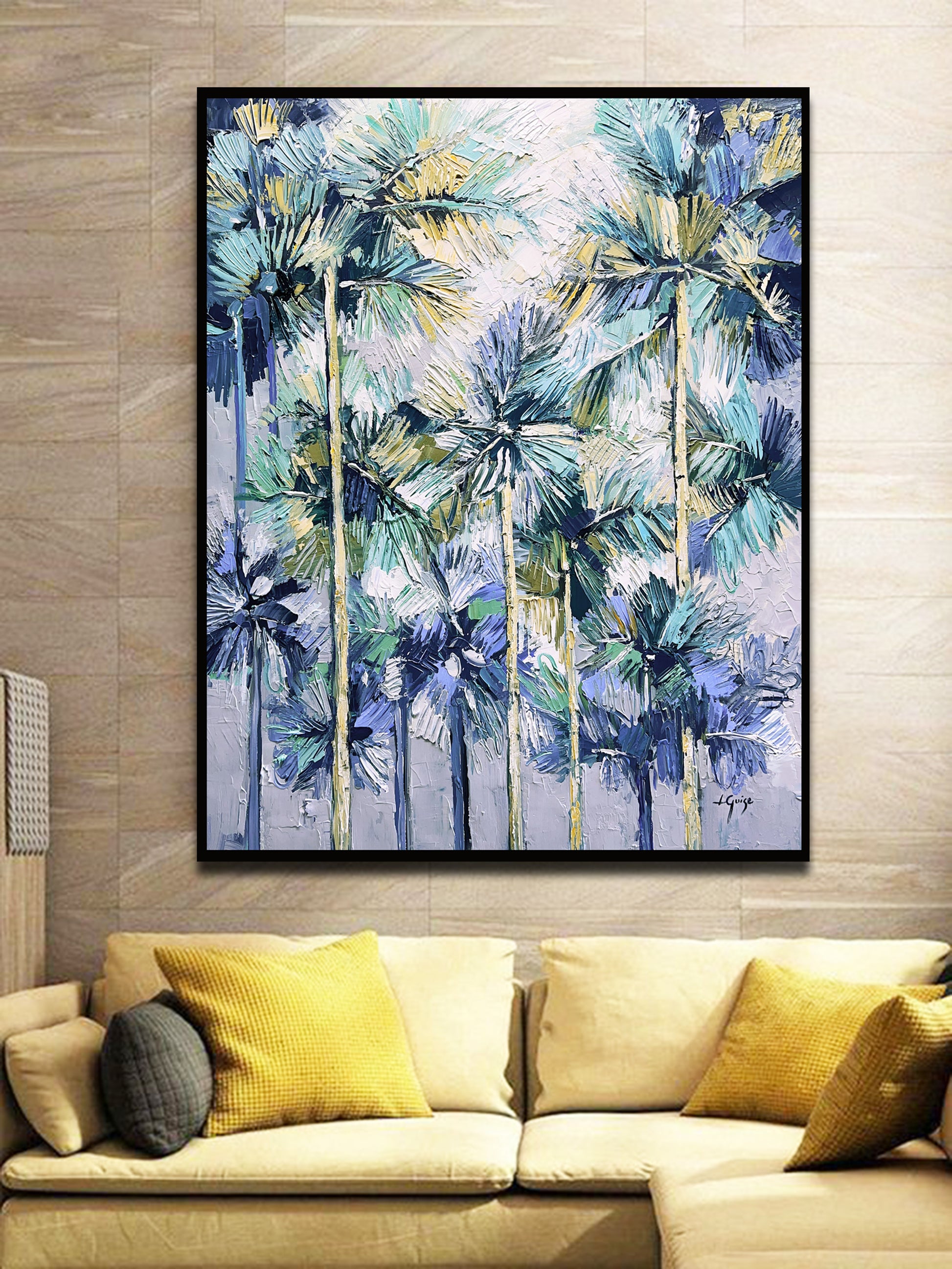 a living room with a couch and a painting on the wall
