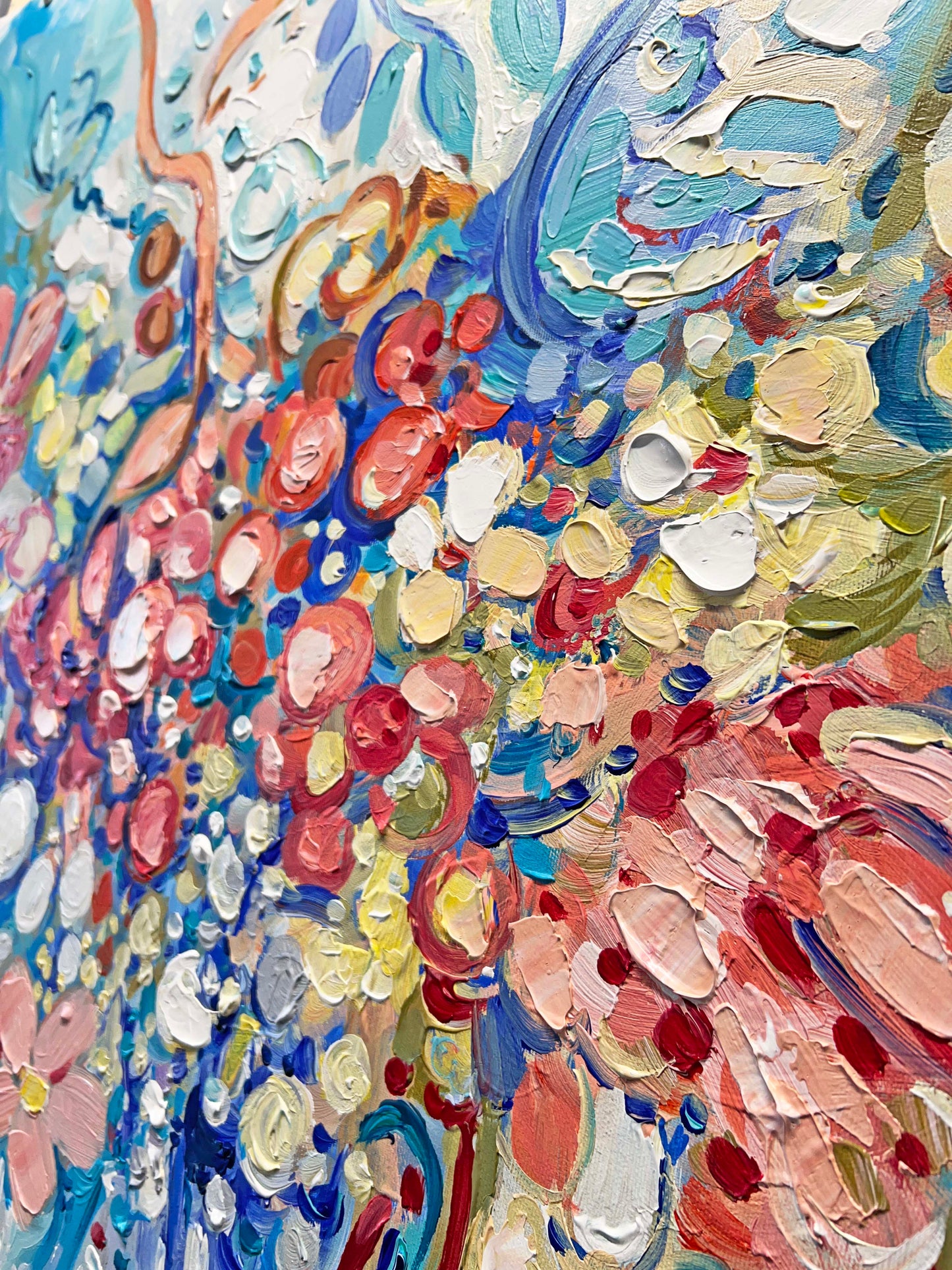 a close up of a painting with lots of colors