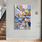 a painting hanging on a wall next to a stair case