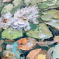 a close up of a painting of flowers and leaves