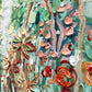 a close up of a painting of flowers