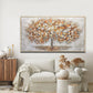 a living room with a couch and a painting on the wall