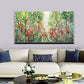 a living room with a couch and a painting on the wall
