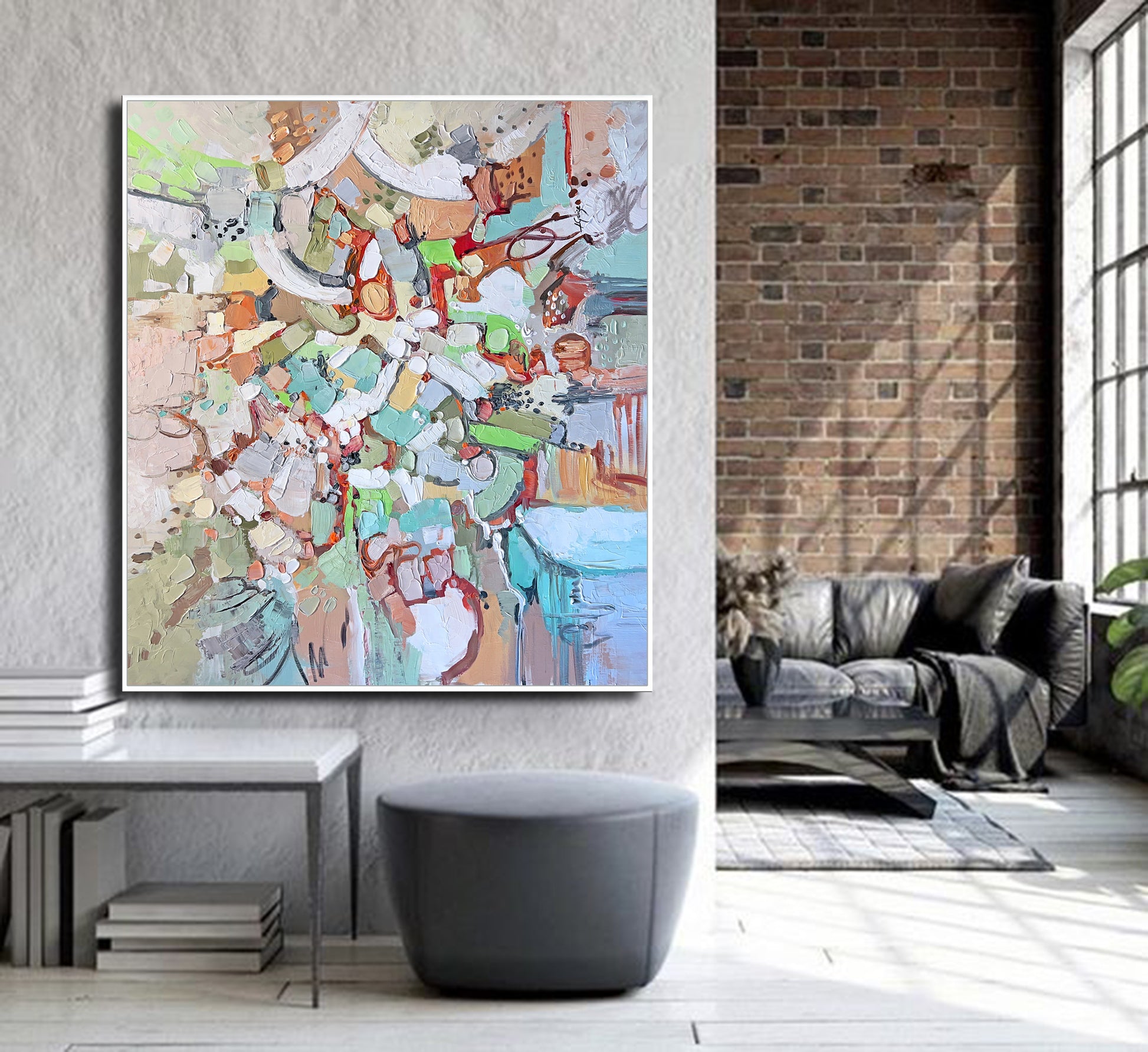 a living room with a large painting on the wall