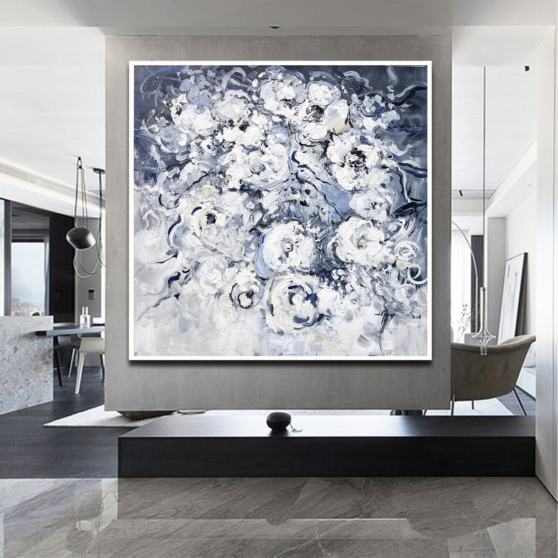 a large painting on a wall in a living room