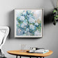 a painting hanging on a wall above a table