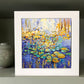 a painting of water lilies on a shelf