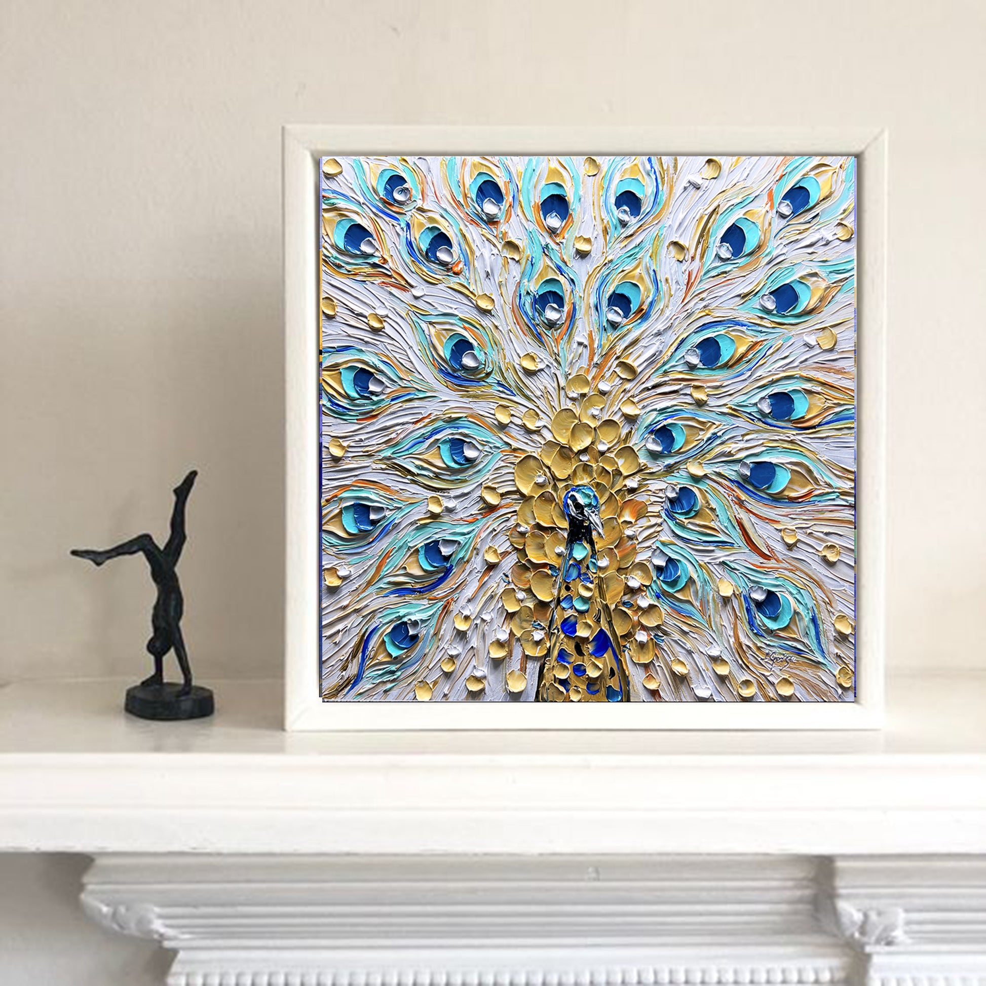 a painting of a peacock is displayed on a mantle